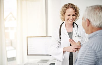 A healthcare professional taking care of their patient.